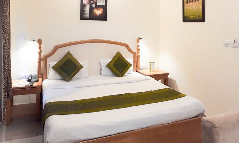 Imagen de la habitación del Hotel Treebo Trend Woodsvilla Suites. Foto 3