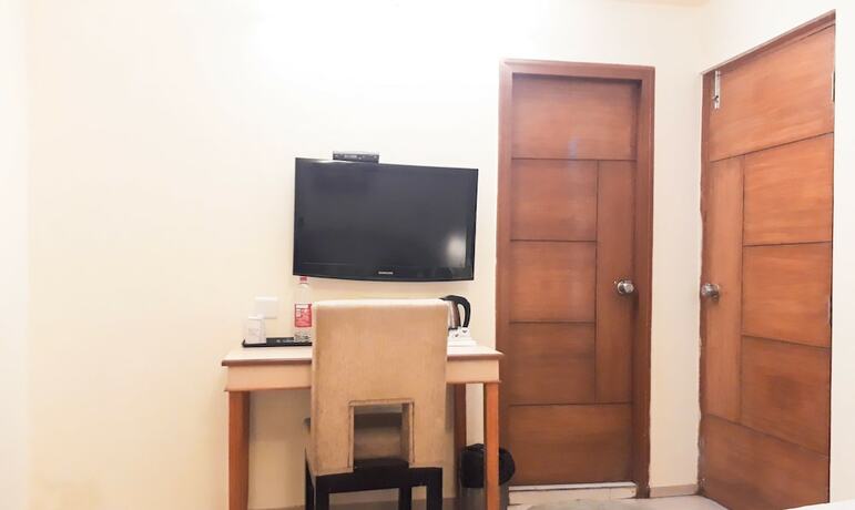 Imagen de la habitación del Hotel Treebo Trend Woodsvilla Suites. Foto 6