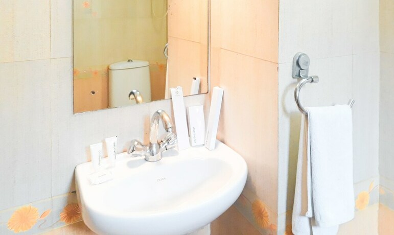 Imagen de la habitación del Hotel Treebo Trend Woodsvilla Suites. Foto 7