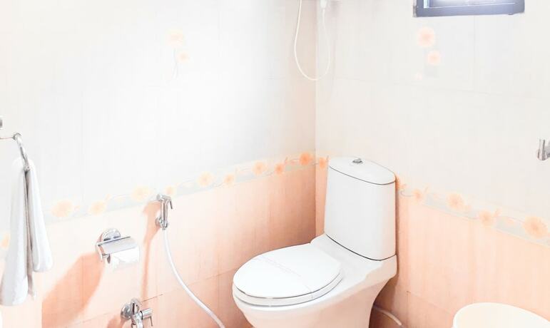 Imagen de la habitación del Hotel Treebo Trend Woodsvilla Suites. Foto 13
