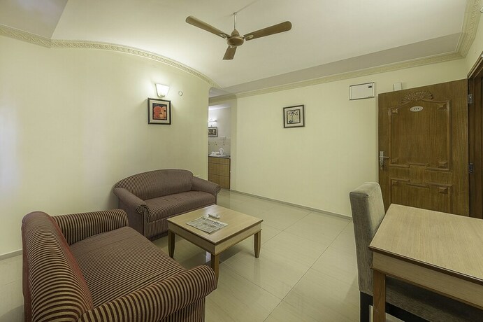 Imagen de la habitación del Hotel Treebo Trend Woodsvilla Suites. Foto 14