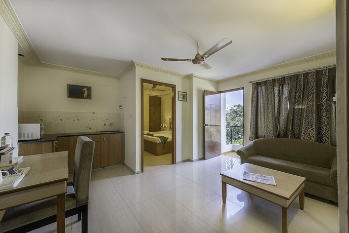 Imagen de la habitación del Hotel Treebo Trend Woodsvilla Suites. Foto 15