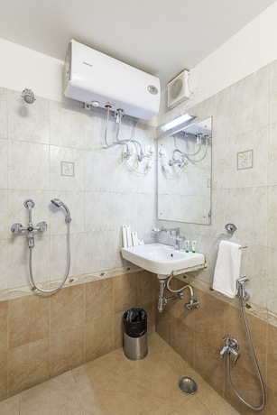 Imagen de la habitación del Hotel Treebo Trend Woodsvilla Suites. Foto 16