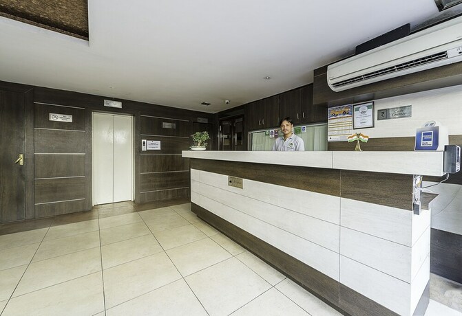 Imagen de los interiores del Hotel Treebo Trend Woodsvilla Suites. Foto 19