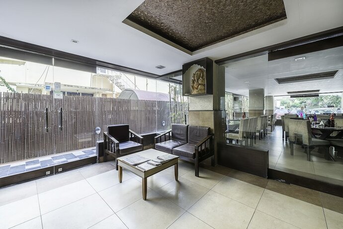 Imagen de los interiores del Hotel Treebo Trend Woodsvilla Suites. Foto 20