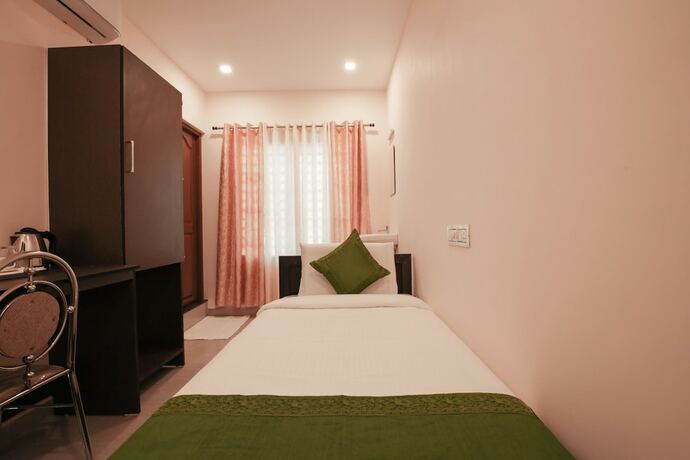 Imagen de la habitación del Hotel Treebo Trip Zion Plaza. Foto 16