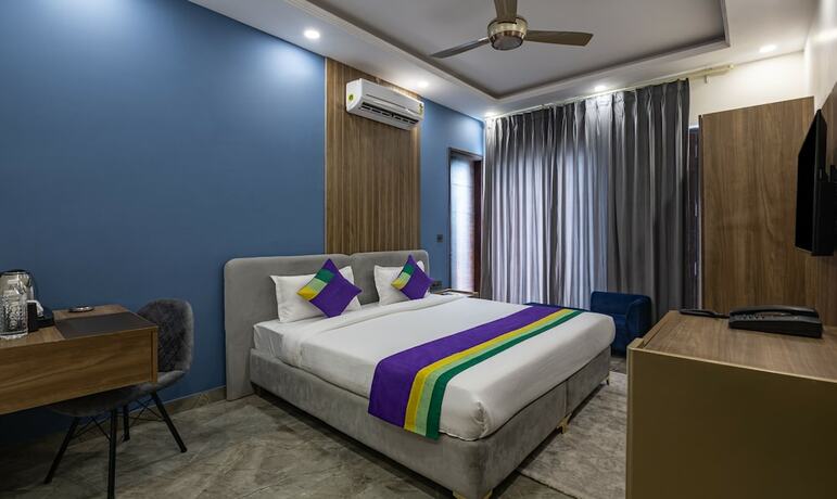 Imagen de la habitación del Hotel Treebo Tryst Embassy Inn. Foto 18