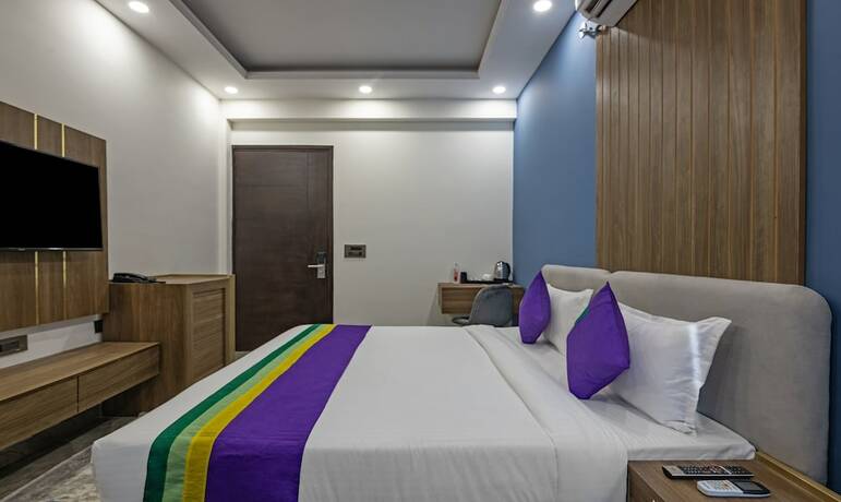 Imagen de la habitación del Hotel Treebo Tryst Embassy Inn. Foto 19