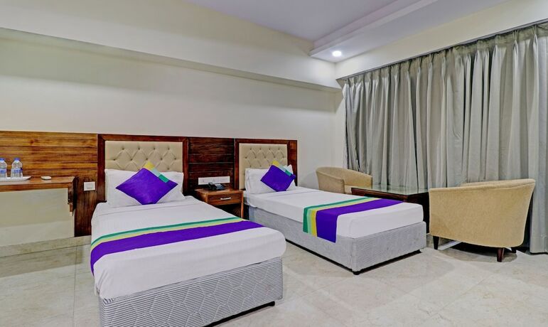 Imagen de la habitación del Hotel Treebo Tryst Pearl Avenue. Foto 19