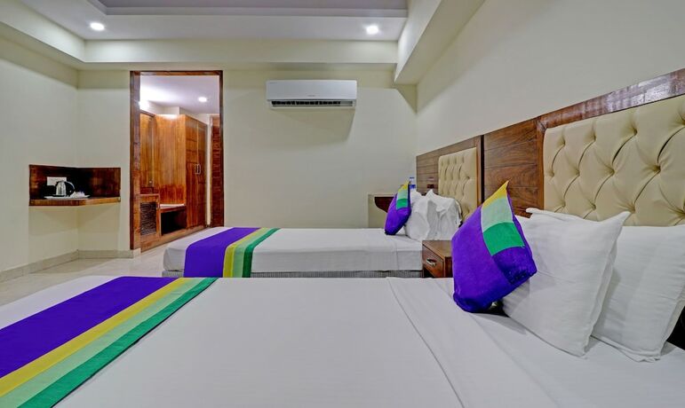 Imagen de la habitación del Hotel Treebo Tryst Pearl Avenue. Foto 20