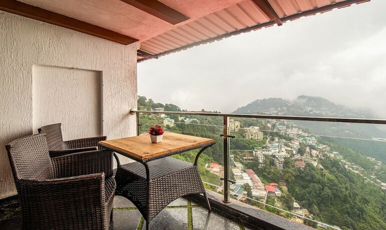 Imagen de la habitación del Hotel Treebo Tryst Queen Of Hills. Foto 20