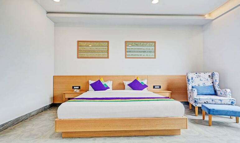 Imagen de la habitación del Hotel Treebo Tryst SR House. Foto 17