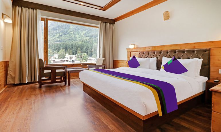 Imagen de la habitación del Hotel Treebo Tryst Sattva With Mountain View. Foto 4
