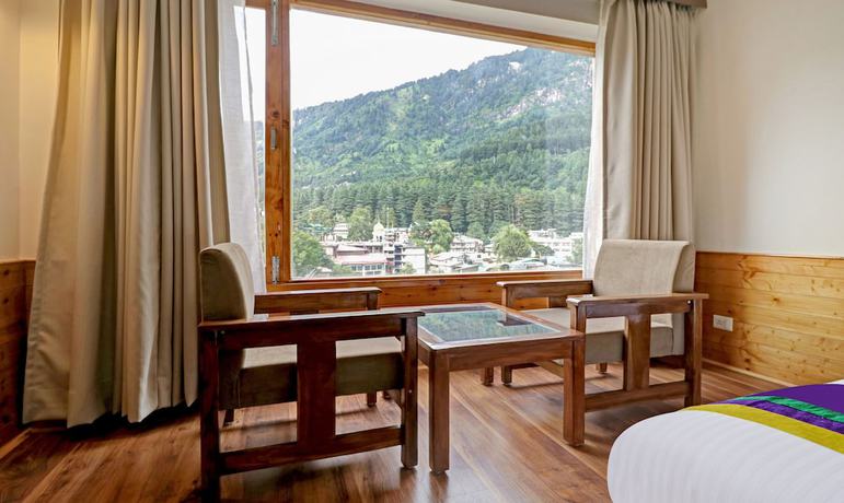 Imagen de la habitación del Hotel Treebo Tryst Sattva With Mountain View. Foto 5