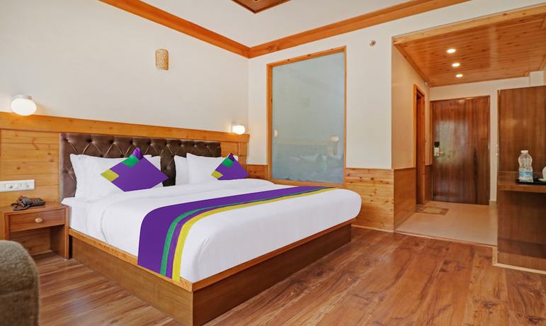 Imagen de la habitación del Hotel Treebo Tryst Sattva With Mountain View. Foto 7