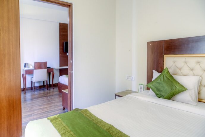 Imagen de la habitación del Hotel Treebo Tryst Sc Residency. Foto 5