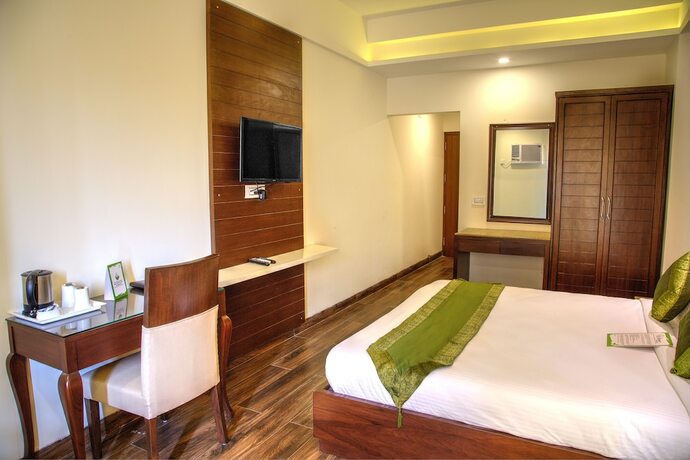 Imagen de la habitación del Hotel Treebo Tryst Sc Residency. Foto 9