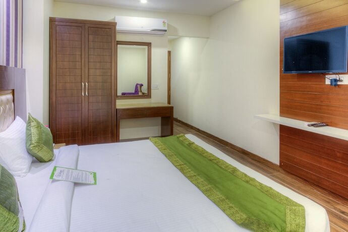 Imagen de la habitación del Hotel Treebo Tryst Sc Residency. Foto 10