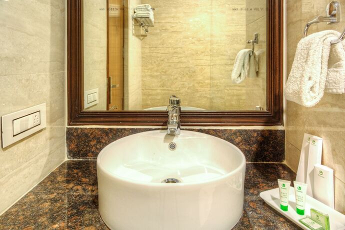 Imagen de la habitación del Hotel Treebo Tryst Sc Residency. Foto 15