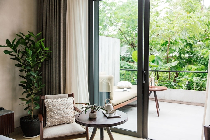 Imagen de la habitación del Hotel Treeline Urban Resort. Foto 3