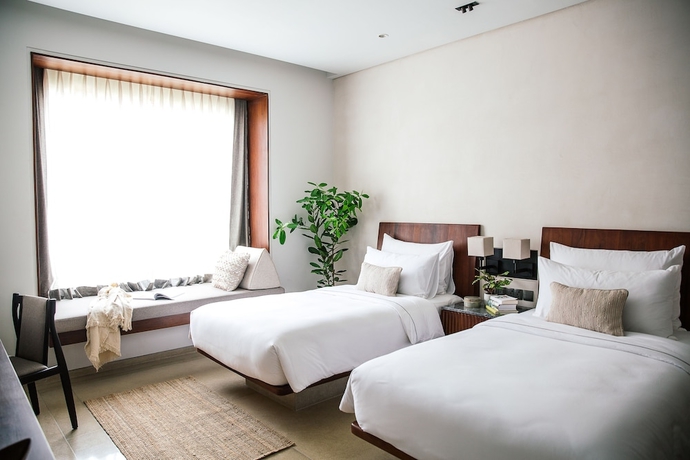 Imagen de la habitación del Hotel Treeline Urban Resort. Foto 10