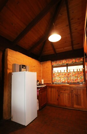 Imagen de la habitación del Hotel Treenbrook Cottages. Foto 19