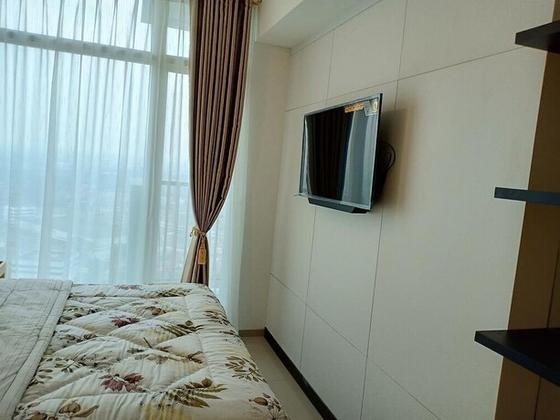 Imagen de la habitación del Hotel Treepark City Apartement By Echa. Foto 19