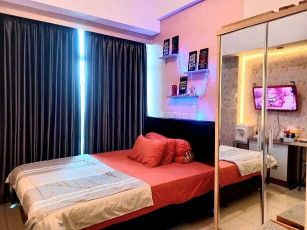 Imagen de la habitación del Hotel Treepark City Apartement By Echa. Foto 21