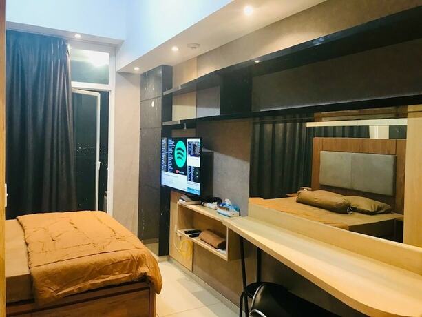 Imagen de la habitación del Hotel Treepark City Apartement By Echa. Foto 23
