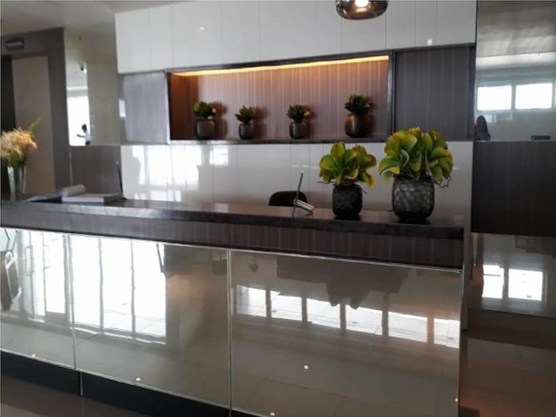 Imagen del bar/restaurante del Hotel Trees Residences By Jhoy. Foto 21