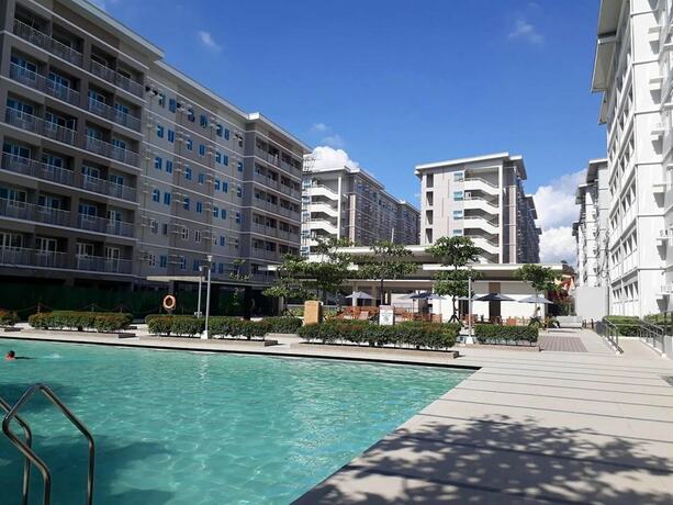 Imagen de la piscina del Hotel Trees Residences By Jhoy. Foto 30