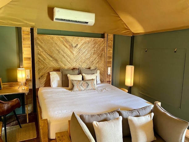 Imagen de la habitación del Hotel Trees and Tigers. Foto 6