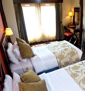 Imagen de la habitación del Hotel Treetops. Foto 11