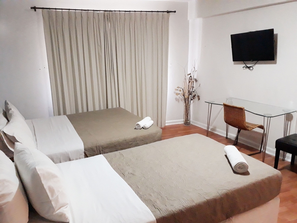 Imagen de la habitación del Hotel Tremo Boutique Parque Forestal. Foto 9