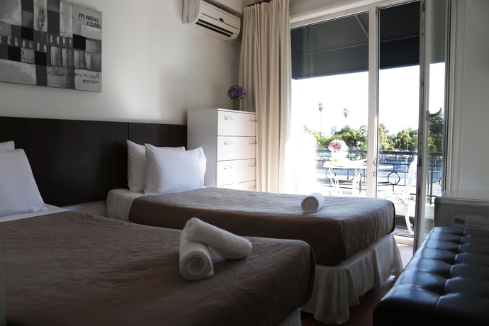 Imagen de la habitación del Hotel Tremo Boutique Parque Forestal. Foto 11