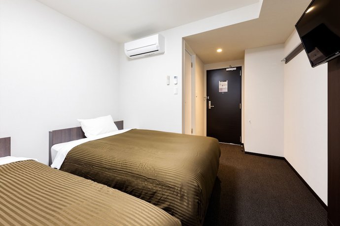 Imagen de la habitación del Hotel Trend Mikawaanjo. Foto 7