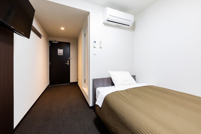 Imagen de la habitación del Hotel Trend Mikawaanjo. Foto 13