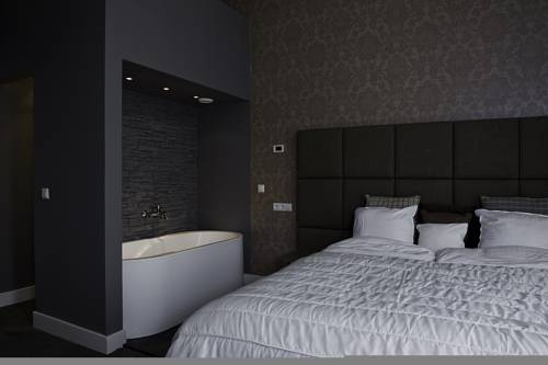Imagen de la habitación del Hotel Tres Boutique. Foto 3