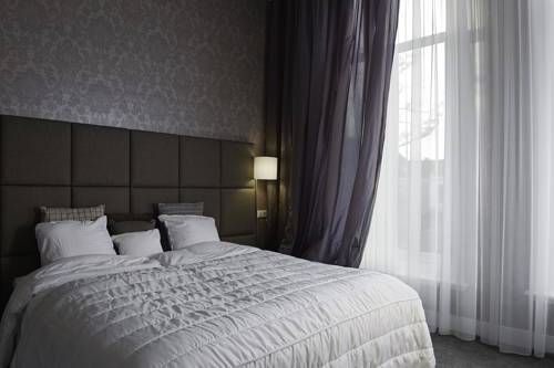 Imagen de la habitación del Hotel Tres Boutique. Foto 5