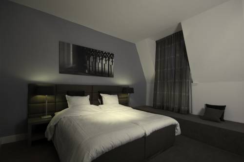 Imagen de la habitación del Hotel Tres Boutique. Foto 9