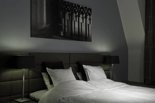 Imagen de la habitación del Hotel Tres Boutique. Foto 10