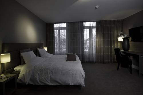 Imagen de la habitación del Hotel Tres Boutique. Foto 11