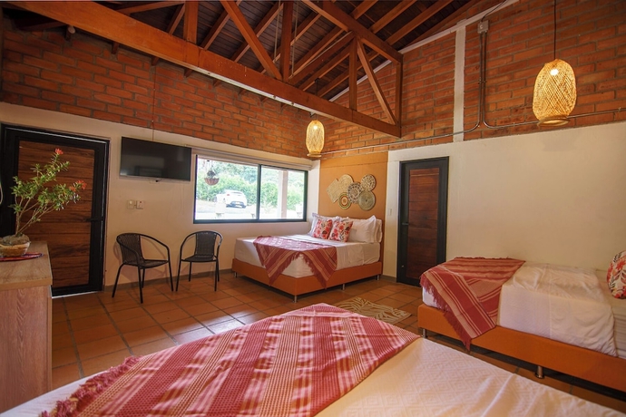 Imagen de la habitación del Hotel Tres Lagos Finca. Foto 6