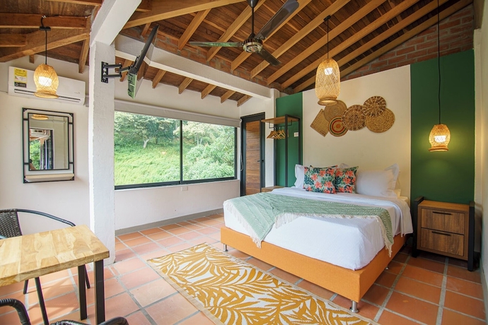 Imagen de la habitación del Hotel Tres Lagos Finca. Foto 12