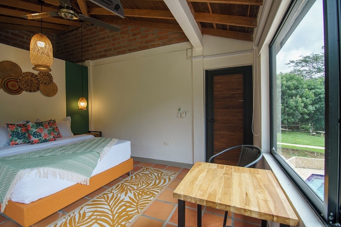 Imagen de la habitación del Hotel Tres Lagos Finca. Foto 13