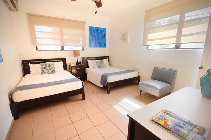 Imagen de la habitación del Hotel Tres Palmas Inn. Foto 5