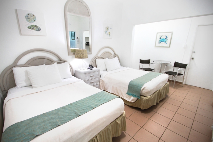 Imagen de la habitación del Hotel Tres Palmas Inn. Foto 6