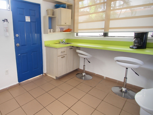 Imagen de la habitación del Hotel Tres Palmas Inn. Foto 8