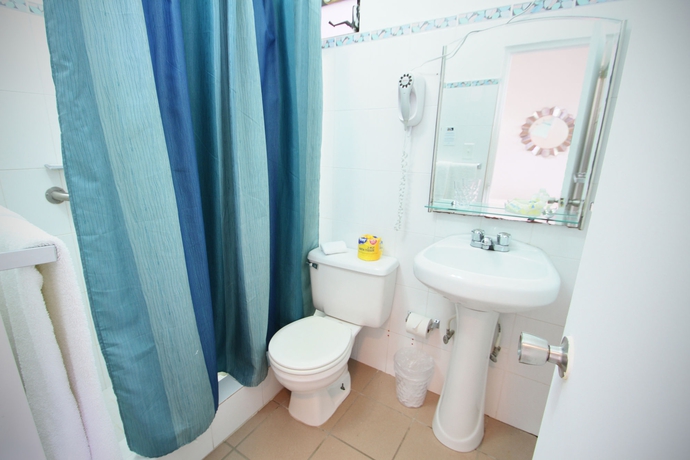 Imagen de la habitación del Hotel Tres Palmas Inn. Foto 10