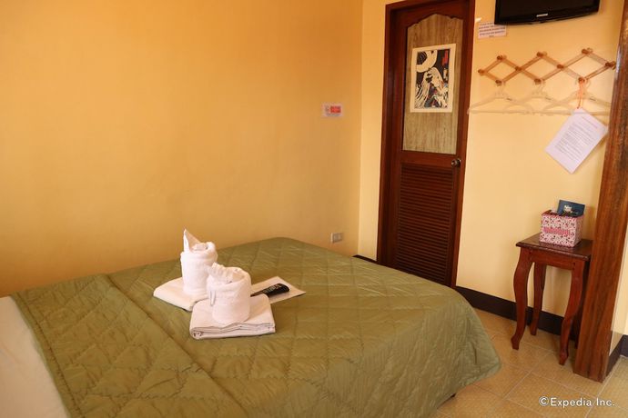 Imagen de la habitación del Hotel Tres Pension House. Foto 10